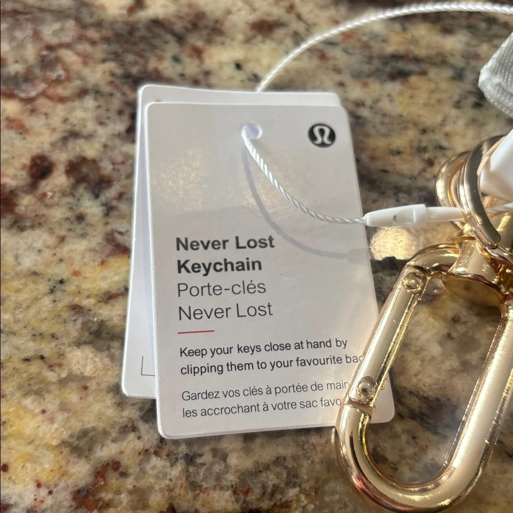 Lululemon Never Lost Keychain Vapor Gold Brand New NWT - Picture 5 of 5